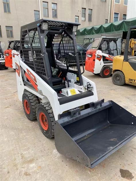 smallest bobcat skid steer with tracks|smallest skid steer made.